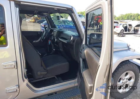 2015 Jeep Wrangler Unlimited Sahara from USA, damaged, VIN 1C4BJWEG9FL570780